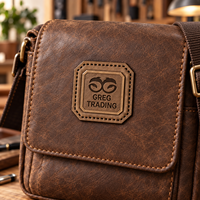 Patch en cuir véritable OEM pour jeans, chapeaux, vêtements, logo personnalisé en relief, étiquettes de marque à coudre sur les vêtements