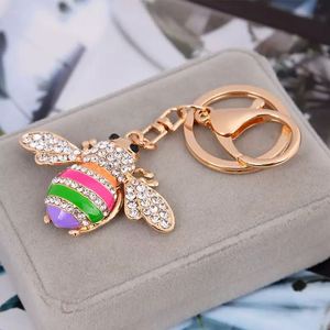 Vente en gros de porte-clés créatifs en forme de petite abeille, pendentifs pour sacs à main pour femmes et petits pendentifs cadeaux - Product Image 5