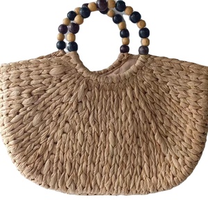 Bolso Bandolera <span class=keywords><strong>de</strong></span> Paja Trenzada Semirredonda Hecho a Mano Huayi 2026 al <span class=keywords><strong>por</strong></span> <span class=keywords><strong>Mayor</strong></span>, Bolso <span class=keywords><strong>de</strong></span> Mano con Asa <span class=keywords><strong>de</strong></span> Cuentas <span class=keywords><strong>de</strong></span> <span class=keywords><strong>Madera</strong></span> para Mujer, Ideal para Verano y Playa - Product Image 1