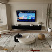 Meuble TV flottant noir minimaliste moderne avec finition grain de bois, console multimédia murale extra longue pour salon de luxe