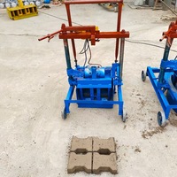 Petite machine à briques manuelle mobile pour la ponte de 2-45 œufs prix de la machine de fabrication de briques en ciment et béton