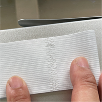 Machine à coudre industrielle automatique VMA pour la couture de rubans élastiques avec dispositif de collecte spécial pour la corde de vêtement