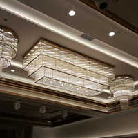 Lustres en cristal LED personnalisés en acier inoxydable de luxe moderne pour hall d'hôtel, villa, grand projet, éclairage décoratif