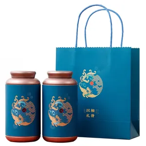 Xin Jia Yi Packaging 명확한 창과 손잡이 점심 주석 상자 전통적인 포장을 가진 주문을 받아서 만들어진 둥근 중국 차 주석 상자
