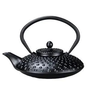 Venta al por mayor de té de café japonés hervidor de agua Vintage juego de té negro 800ml perla en forma de vieira tetera de hierro fundido con filtro