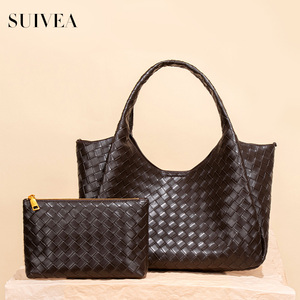 Venta Directa de Fábrica: Bolsos de mano con relieve estilo vintage, bolsos de hombro suaves y cómodos, y bolsos tipo cubo informales. - Product Image 1