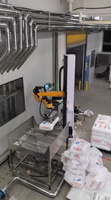 Robot colonne pour le dépalettisage de sachets de sirop de glucose/maltose, bras robotisé, 25 kg/sachet, 100 sachets/h, qualité alimentaire, option antidéflagrante, PLC