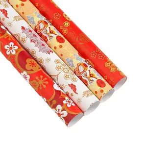 Wholesale cheap spot 130gHappy Red New Year Asian plum blossom lion dance auspicious cloud New Year gift gift paper 50x80cm