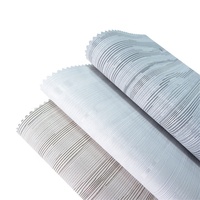 Tissu pour stores enrouleurs en fibre de verre, doux, résistant à la décoloration, durable, résistant aux UV, respirant, perforé, occultant à 100% intégré