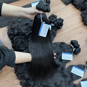 Produit chaud trame ondulée naturelle 100 grammes par paquets Machine Double trame 100% cheveux vietnamiens bruts sans enchevêtrement prix de gros - Product Image 2