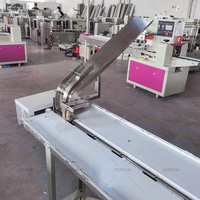 Machine d'emballage automatique de type coussin pour bâtonnets glacés, emballage en rouleau de film, étiquetage alimentaire et utilisation de feuille métallique