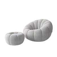 Petit canapé moderne rotatif crème personnalisé chaise de loisirs incurvée aux pétales de citrouille pour chambre à coucher et balcon tapisserie d'ameublement en tissu