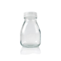 Bouteilles de boisson de jus de fruits de lait en verre vides de forme carrée courte de 10oz 16oz avec le chapeau inviolable blanc