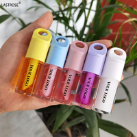 Vente en gros d'huile pour les lèvres à saveur de fruits Huile pour les lèvres repulpante hydratante et végétalienne Huile pour les lèvres à changement de température DIY Tube