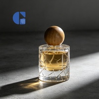 Flacon de parfum en verre transparent cylindrique de luxe, coupe géométrique, 100 ml, avec bouchon, logo personnalisable, boîte d'emballage