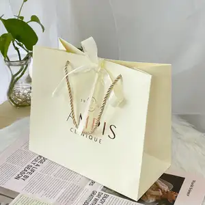 Saco de papel branco com laço para compras de presente de luxo OEM personalizado Lipack