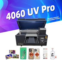 Expédition rapide Imprimante numérique hybride à jet d'encre UV à plat 4060 de Guangzhou pour la vente en gros avec un bon prix Appareil UV DTF en option