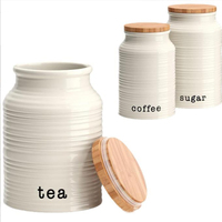Vente en gros Bocal de rangement en céramique blanche personnalisé Boîte à café, sucre et thé avec couvercle pour les rangements domestiques et les bocaux à biscuits