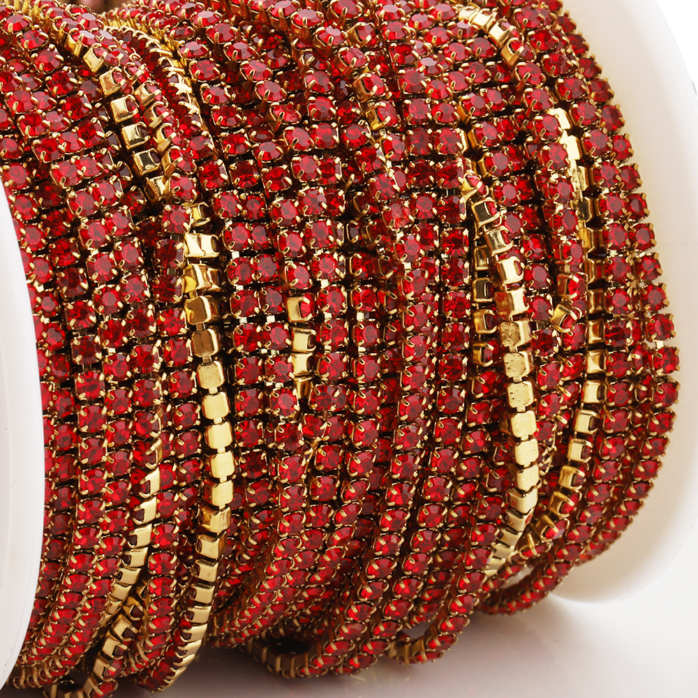 Gold base with red diamonds