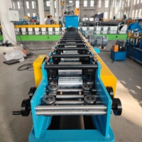 Machine de formage de profilés de volets roulants hydrauliques automatiques, contrôlée par PLC, pour profilés de volets roulants en acier à roulement moteur