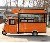 Tricycle électrique orange, camion de restauration mobile, chariot de vente de nourriture entièrement équipé, cuisine mobile pour la vente de rue