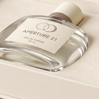 Boîte à parfum rigide de style livre blanc magnétique de luxe sur mesure avec emballage écologique recyclable pour usage cosmétique