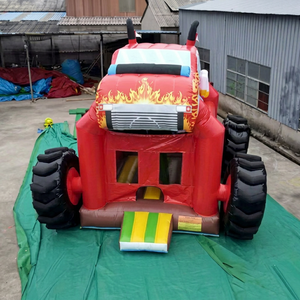 Château gonflable écologique en PVC sur le thème des Monster Truck avec toboggan intégré pour le plaisir - Product Image 1
