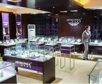 Vitrine et présentoir d'intérieur pour bijouterie, en LED dorée, écologiques et de haute qualité, pour l'aménagement de magasins de détail (vente en gros)