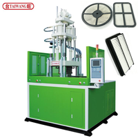Machine de moulage par injection verticale de haute précision TAIWANG à double table coulissante contrôlée par PLC pour PVC/PC/PS/PE/PP