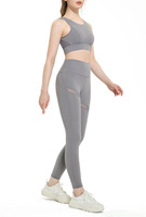 Ensemble de vêtements de sport pour femmes avec logo personnalisé soutien-gorge évidé au dos et leggings taille haute ensemble de yoga deux pièces vêtements de course en maille sexy pour la gym
