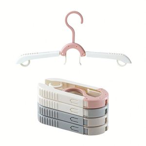Cintres de voyage en plastique coloré en gros, accessoires de voyage, cintres pliables portables, étendoir à linge pour le voyage - Product Image 1