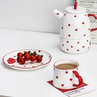 Ensemble de tasses à thé en céramique peintes à la main rouge et blanches avec bord irrégulier et base antidérapante pour le petit-déjeuner quotidien et les moments douillets