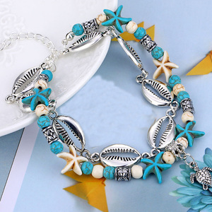 Chevillères de plage bohèmes double couche avec chaîne en coquillages cauris argentés, étoiles de mer turquoise et tortues marines, bijoux de pied pour les vacances - Product Image 5