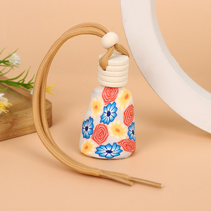 Botella de perfume de coche recargable con cubierta de arcilla suave, flor mixta, difusor colgante personalizado para ambientador y decoración de coche - Product Image 5