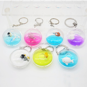 Porte-clés 3D <span class=keywords><strong>en</strong></span> acrylique transparent avec paillettes liquides flottantes, motif dessin animé, prix usine promotionnel - Product Image 1