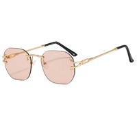 Femmes Hommes Best-seller Lunettes de soleil sans cadre en diamant Lentilles UV400 Lunettes de soleil tendance en métal coloré