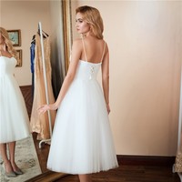 Haute qualité femmes blanches sans manches Sexy Bodycon tenue décontracté robes de soirée Sexy Tutu robes