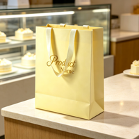 Vente en gros d'usine, sacs en papier kraft personnalisés de luxe, sacs cadeaux artisanaux jaunes, sacs de shopping imprimés avec logo