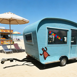 Blue Curved Food <b>Trailer</b> With Bear Decal And Colorful Window Letters For Beach Use - Product Image 1