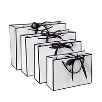 Sac en papier recyclé avec poignée, imprimé sur mesure avec logo de marque, pour la promotion de vêtements de luxe, cadeaux, bijoux, vente au détail