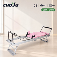 Machine de Pilates compacte rose pliable pour usage domestique, lit de yoga en fer avec chariot pour l'entraînement musculaire