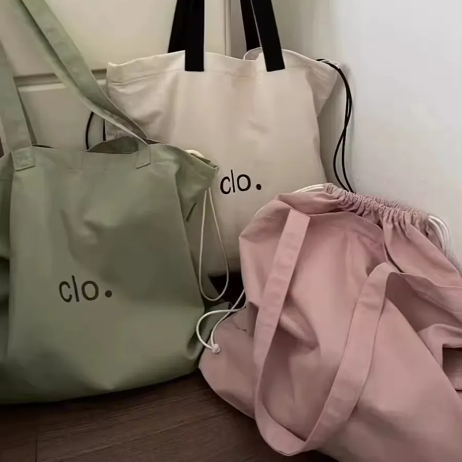 2024 nuova borsa di moda in tela con coulisse in cotone organico Tote Bag Logo personalizzato