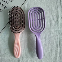 2023 boucle personnalisée démêlant brosse à cheveux moderne 12 pagaie peigne forme ovale poils de sanglier rembourré Compact bouclés pagaie Logo personnalisé