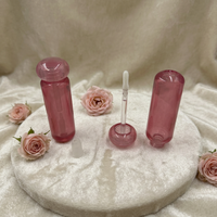 Tube de brillant à lèvres transparent rose effet cristal, tube de gloss en forme d'apsule, contenant de sérum pour les lèvres