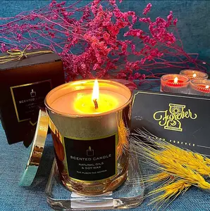 Vendita calda candela profumata forte personalizzata olio essenziale candela di cera di soia pura candela di lusso in vaso di vetro dorato con confezione