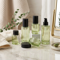 Ensemble d'emballages cosmétiques pour soins de la peau, flacons et pots en verre épais avec bouchon à vis et impression sérigraphique pour crème de soin de la peau