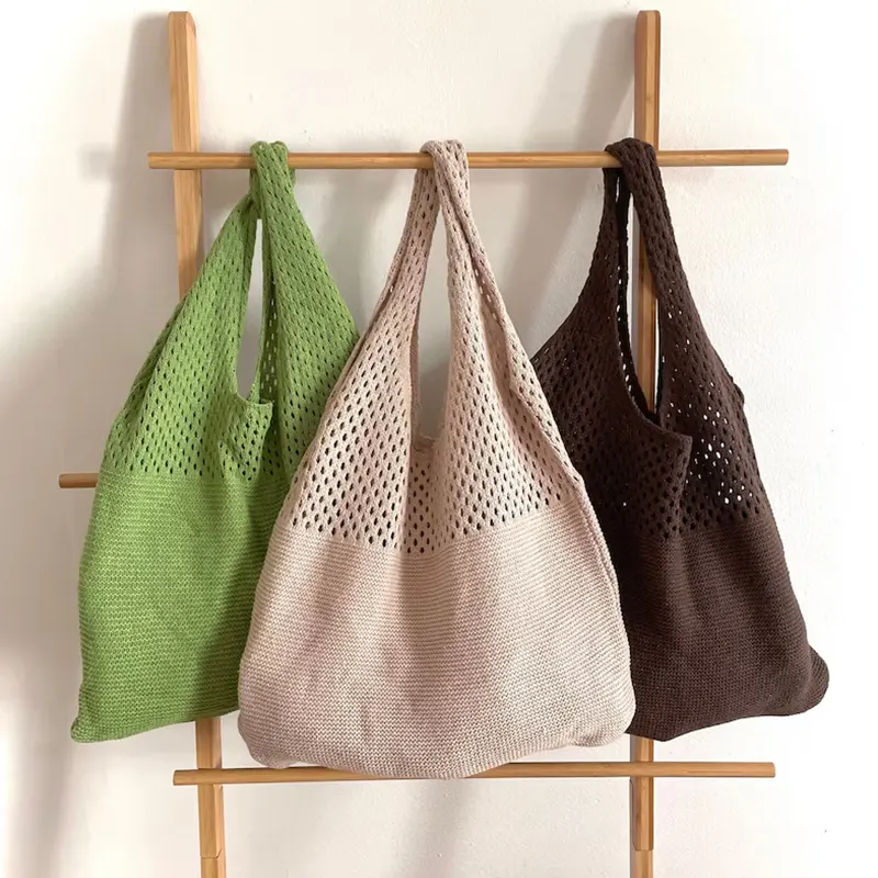 Vente en gros de sac fourre-tout pour femmes avec étiquette de marque propre personnalisé Nouvel arrivage sac tricoté à l'entrejambe sac tissé au crochet de plage en maille évidée