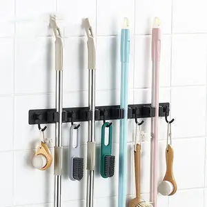 Con gancio portautensili Organizer supporto per scopa nero autoadesivo per montaggio a parete in acciaio inossidabile - Product Image 1