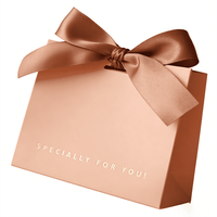 Sac de transport de luxe pour parfum, bougie, cadeau, emballage de marque, sac cadeau en papier rose blush avec ruban en satin