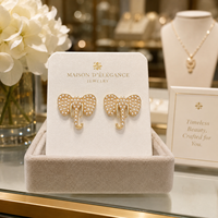 Boucles d'oreilles clous éléphant mignonnes en métal plaqué or avec imitation perle, personnalisées, de la marque Delta Group Label DST, bijoux pour femmes, idéales pour les cadeaux